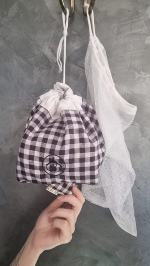 Distributeur carreaux noirs et blancs
